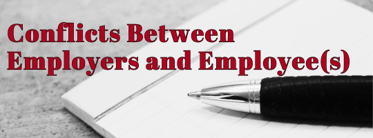 Heading: Conflicts Between Employers and Employee(s) displayed over a notebook and pen on a desk.